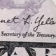 Secretary of the Treasury Janet Yellen's signature is shown on five dollar bills during a visit to the Bureau of Engraving and Printing's (BEP) Western Currency Facility in Fort Worth.